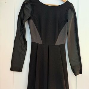 Elegant Black Dress with Sheer Sleeves